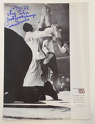 Boxer Carmen Basilio signed magazine page. 8x10 inches
