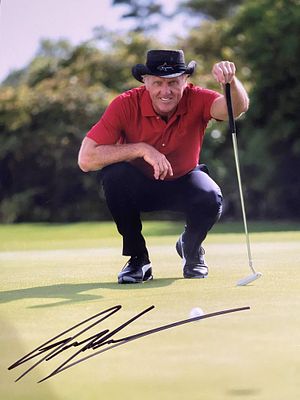 Greg Norman signed photo. 8x10 inches