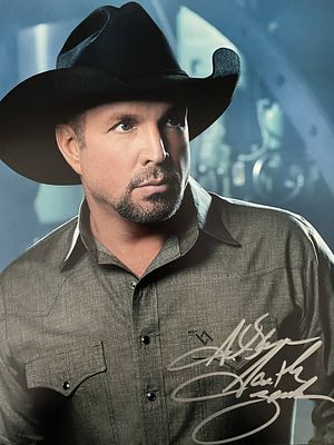 Garth Brooks signed photo. 8x10 inches