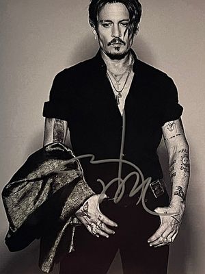 Johnny Depp signed photo. 8x10 inches