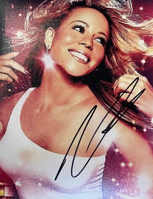 Mariah Carey signed photo. 8x10 inches
