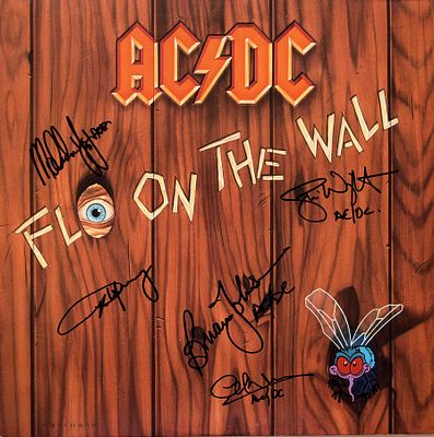 AC/DC signed Fly On The Wall album. AC/DC 1986 Fly On The Wall album autographed by Brian 