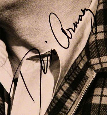 Lucille Ball and Desi Arnaz signed photo. 8 in. by 10 in. Black and white photo from "I Love 