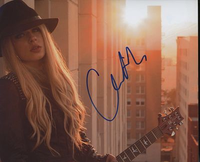 Orianthi signed photo. Australian musician Orianthi signed photo. 8x10 inches