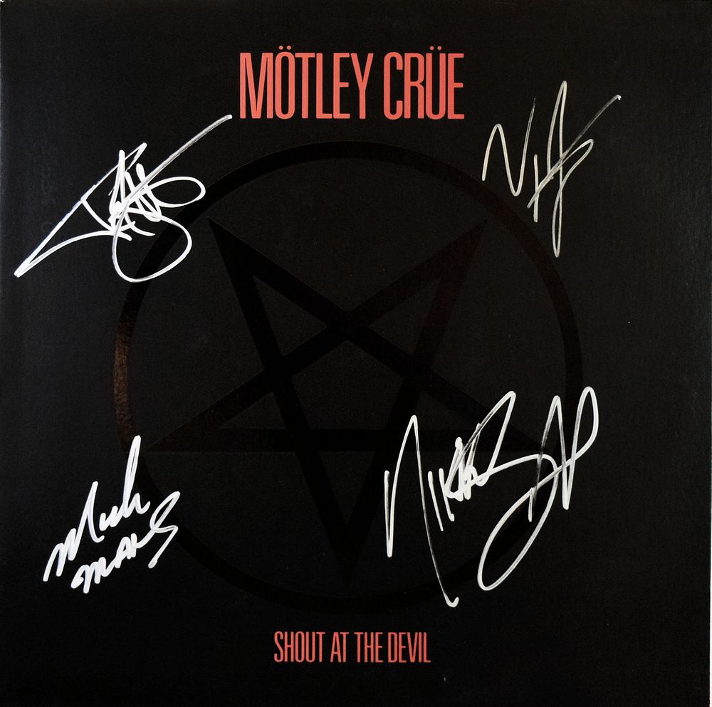 Motley Crue signed Shout At The Devil album. Motley Crue 1983 Shout At The Devil album 