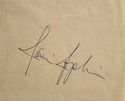 Janis Joplin signature slip. 4 1/4 in. by 3 1/2 in. slip signed: Janis Joplin.