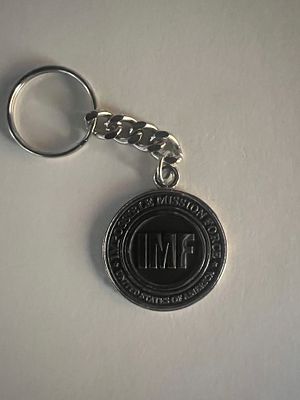 Mission Impossible keychain. 1x1 inch