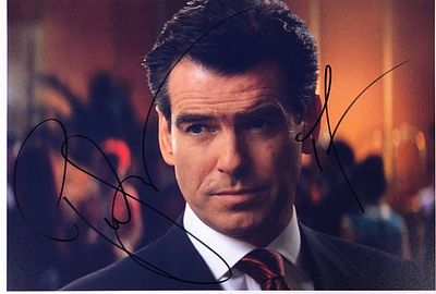 James Bond Pierce Brosnan facsimile signed movie photo. 8x10 inches. This item is a reprint of 