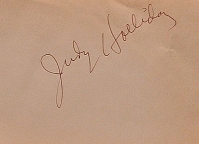 Judy Holliday signature slip. Judy Holliday 5 1/2 in. by 4 in. signature slip