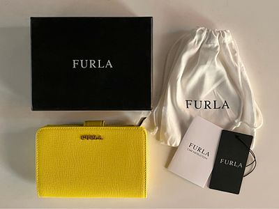 Furla Babylon M Zip around Wallet. Furla Babylon M zip around wallet in Sunny leather. The 