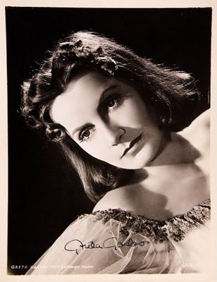 Greta Garbo signed portrait photo. 8 in. by 10 in. Black and white portrait photo autographed by 