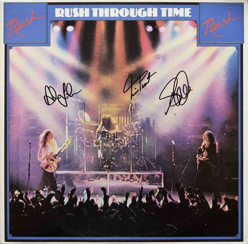 Rush signed Rush Through Time album. Rush Rush Through Time album. Signed: Neil Peart, Geddy Lee 