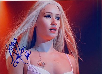 Iggy Azalea facsimile signed photo. 8x10 inches. This item is a reprint of an original autograph