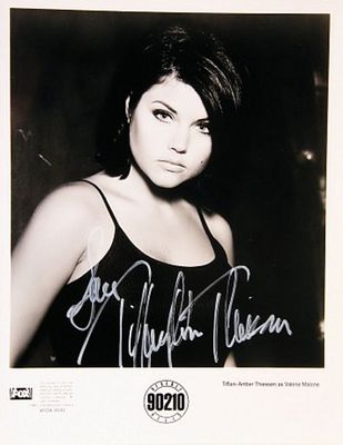 Beverly Hills 90210 Tiffani Amber Thiessen signed promo photo. 8 in. by 10 in. Black and white 