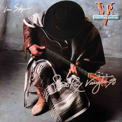Stevie Ray Vaughan In Step signed album. Stevie Ray Vaughan 1989 In Step signed album 