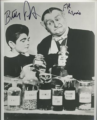 The Munsters cast signed photo. The Munsters photo autographed by Butch Patrick and Al Lewis. 