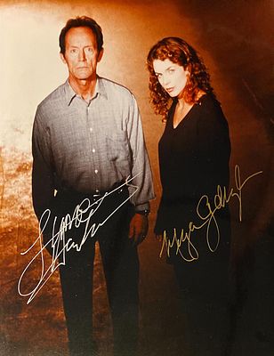 Millennium Signed Photo Autographed by Lance Henriksen and Megan Gallagher. 8x10 inches