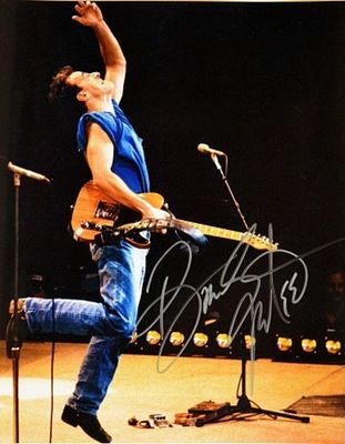 Bruce Springsteen facsimile signed promo photo. Columbia promotional photo autographed by Bruce 