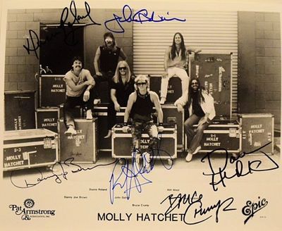 Molly Hatchet facsimile signed promo photo. Molly Hatchet Epic promotional photo autographed by 