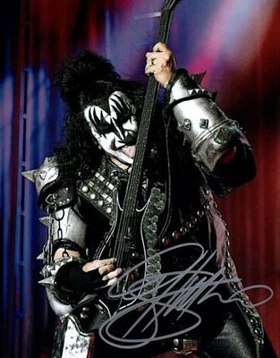 Kiss Gene Simmons facsimile signed photo. 8x10 inches. This item is a reprint of an original 