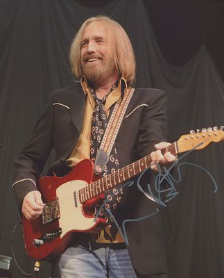 Tom Petty facsimile signed photo. Tom Petty autographed photo. 8x10 inches. This item is a 