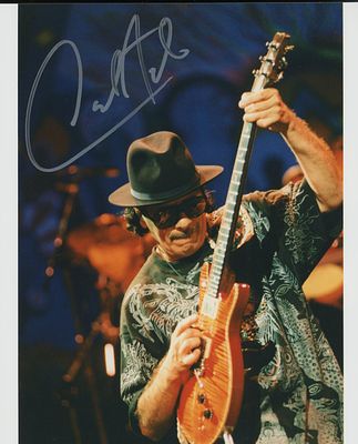 Santana facsimile signed photo. Carlos Santana signed photo. 8x10 in. This item is a reprint of 