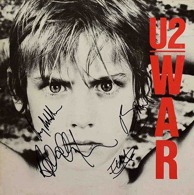 U2 signed War album. U2 1983 War album signed: Bono, The Edge, Adam Clayton, and Larry Mullen Jr.