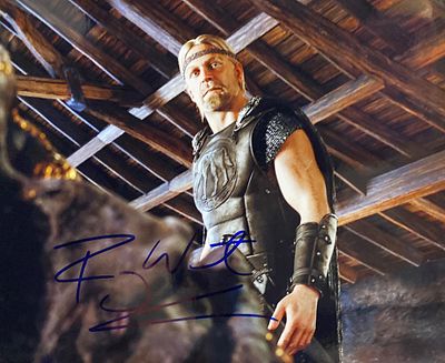 Beowulf Ray Winstone signed movie photo. Beowulf signed movie photo autographed by Ray Winstone. 