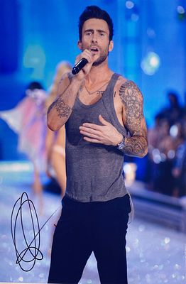 Adam Levine facsimile signed photo. 8x10 inches. This item is a reprint of an original autograph