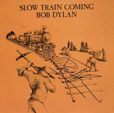 Bob Dylan signed Slow Train Coming album. Bob Dylan 1979 Slow Train Coming album autographed by 