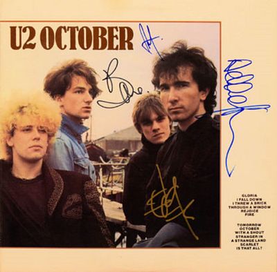 U2 signed October album. U2 1981 October album autographed by Bono, The Edge, Adam Clayton, and 