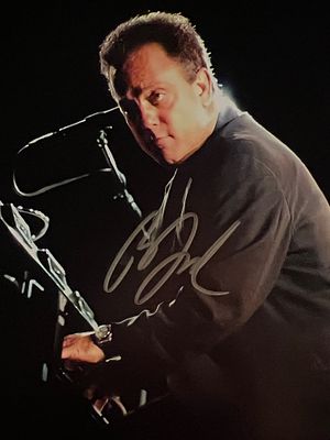 Billy Joel signed photo. 8x10 inches