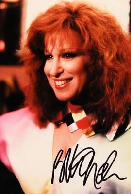 Bette Midler signed portrait photo. 8 in. by 10 in. Portrait photo autographed by Bette Midler.