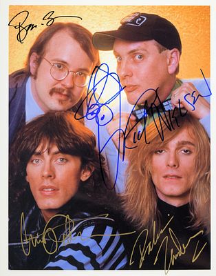 Cheap Trick signed promo photo. 8 in. by 10 in. Cheap Trick promotional photo autographed by Bun 