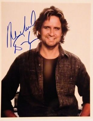 Romancing The Stone Michael Douglas signed portrait photo. 8 in. by 10 in. Black and white 