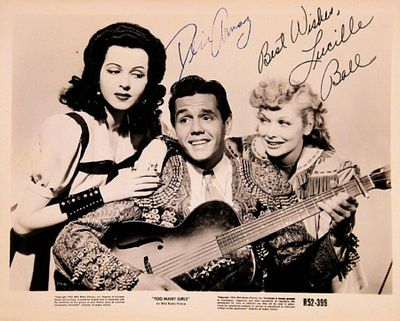 Lucille Ball and Desi Arnaz signed movie still photo. 8 in. by 10 in. Black and white movie 