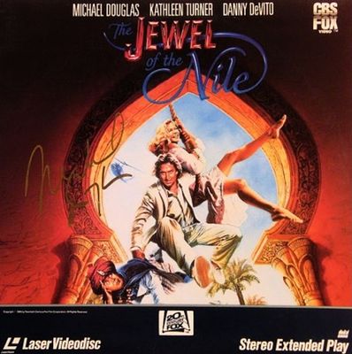 Michael Douglas signed LaserDisc. LaserDisc of "The Jewel Of The Nile" autographed by Michael 