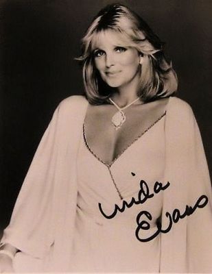 Dallas Linda Evans signed portrait photo. 8 in. by 10 in. Black and white portrait photo 