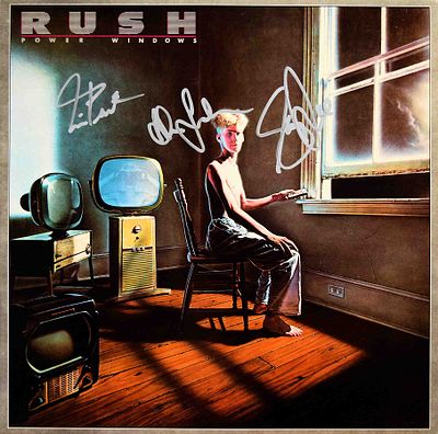 Rush signed Power Windows album. Rush 1985 Power Windows album. Signed: Neil Peart, Geddy Lee 