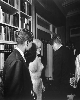 Marilyn Monroe and JFK reprint photo. Marilyn Monroe was an American actress, model, and singer. 