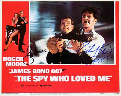 James Bond Roger Moore & Richard Kiel signed lobby card. 14 in. by 11 in. Lobby Card from the 