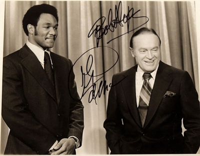 Bob Hope & George Foreman signed portrait photo. 8 in. by 10 in. 1973 Portrait photo from "The 