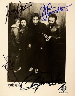 The Who signed promo photo. 8 in. by 10 in. The Who black and white Warner Brothers promotional 