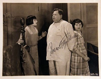 Silent Film Star Roscoe Arbuckle signed movie still photo. 8 in. by 10 in. Black and white movie 