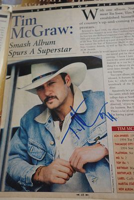 Tim McGraw signed magazine photo. 8x10 inches