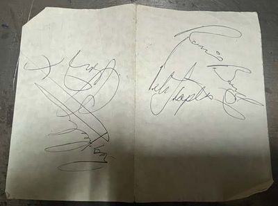 Troggs Band Members signed page. Troggs autographs 5x7 folded page signed by Reg Presley, Ronnie 