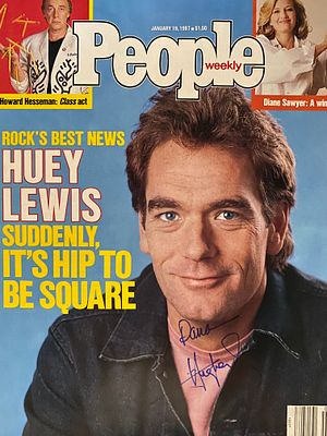 Huey Lewis
signed magazine cover. Huey Lewissigned magazine cover