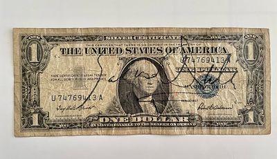 Salvador Dali signed 1957 dollar bill. Salvador Dali signed dollar bill. Bill is in fair shape 