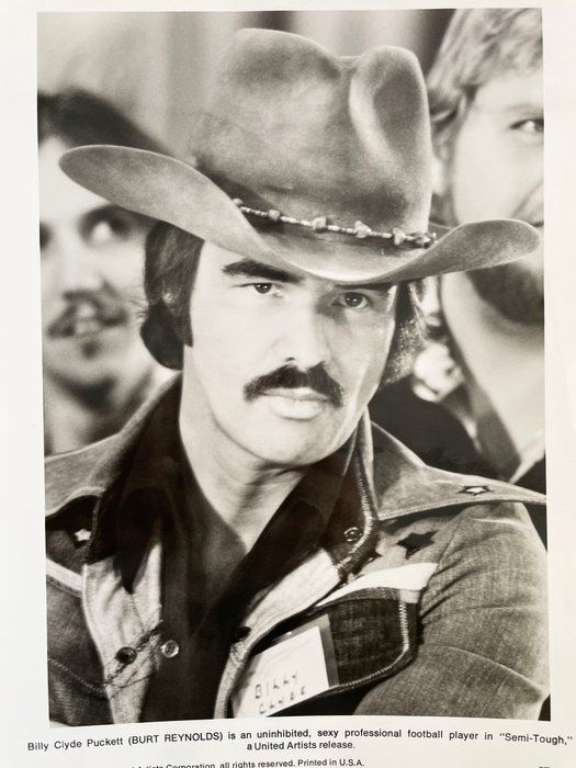 Lot 396: Semi-Tough Burt Reynolds unsigned movie photo