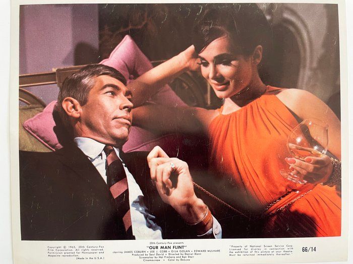 Lot 571: Our Man Flint James Coburn and Gila Golan original 1966 vintage movie photo